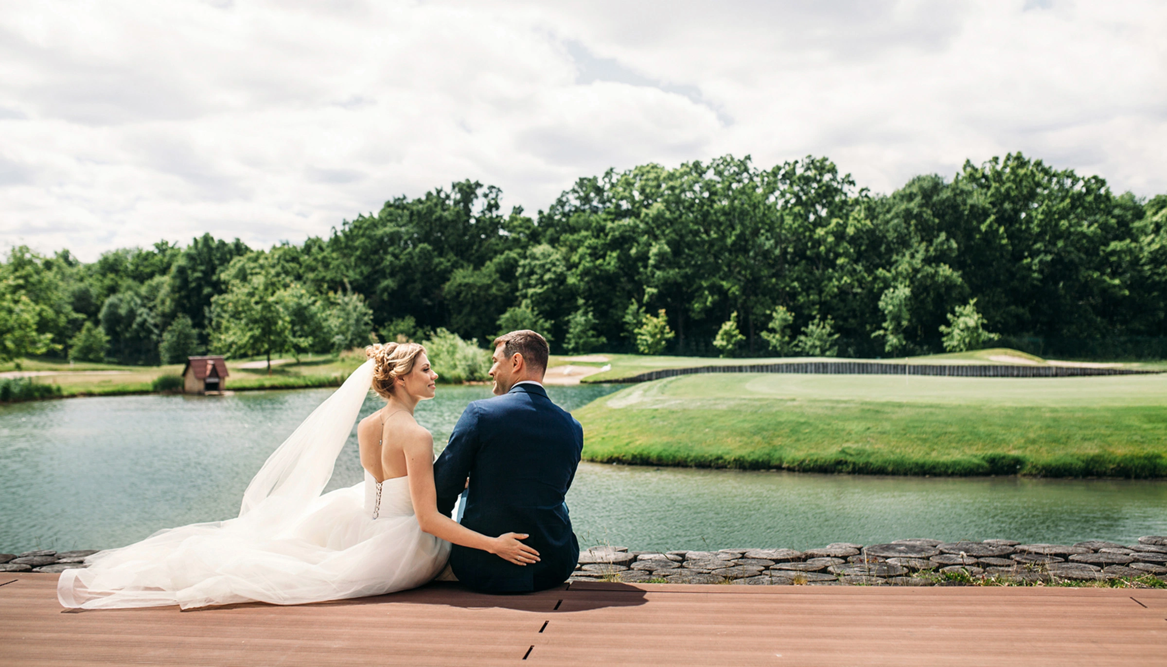 The bride is standing behind the curtains, captured by Wedding Photographer Vancouver